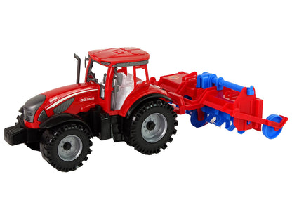 Roter Traktor mit Pflug Friktionsantrieb
