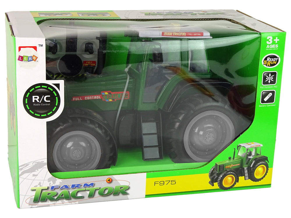 Grüner und schwarzer ferngesteuerter Traktor