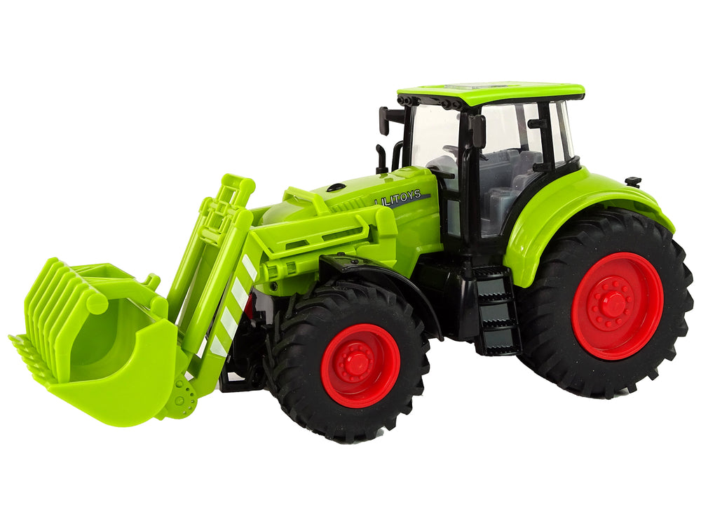 Large tractor with green wheel and friction drive
