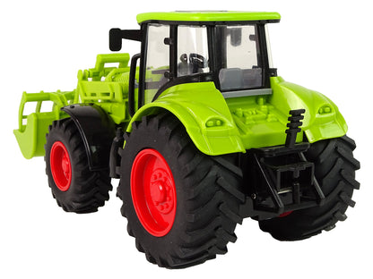 Large tractor with green wheel and friction drive